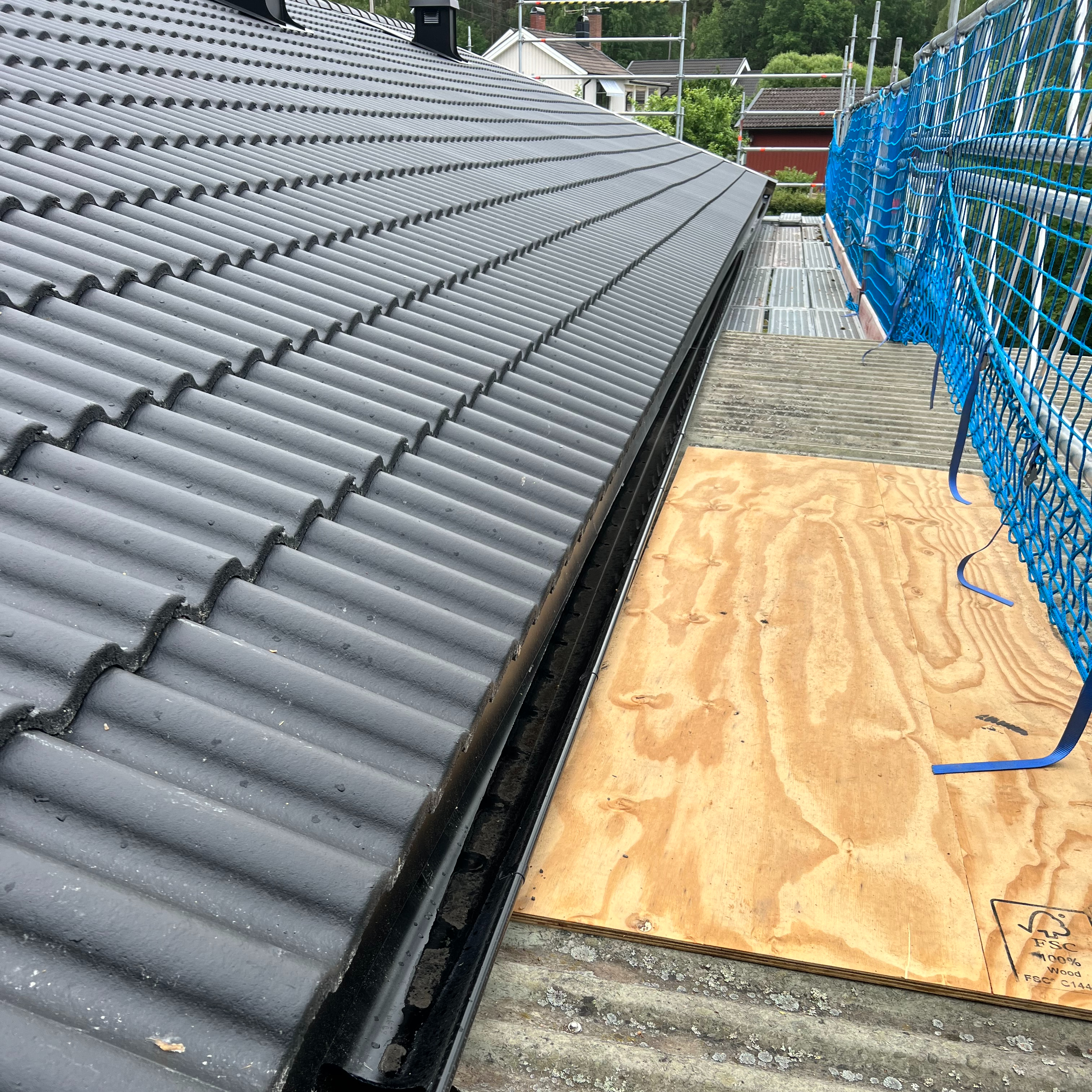 takläggning av projekbygg i österåker ab